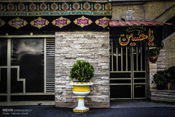 Hosseini flags adorn facades of houses 