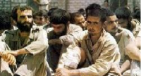مسابقه کشتی رزمنده سیستانی با جاسم بعثی در زندان تکریت