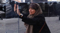  زن محجبه در زندان شیشه ای+عکس