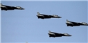 Iranian Air Force Jets Destroy Moving Targets in Wargames over Persian Gulf 