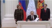 پوتین سند پیوستن جزیره کریمه به روسیه را امضا کرد
