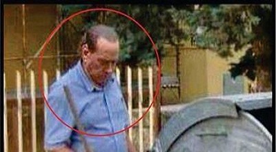 برلوسکونی درحال «جاروکشی»!عکس